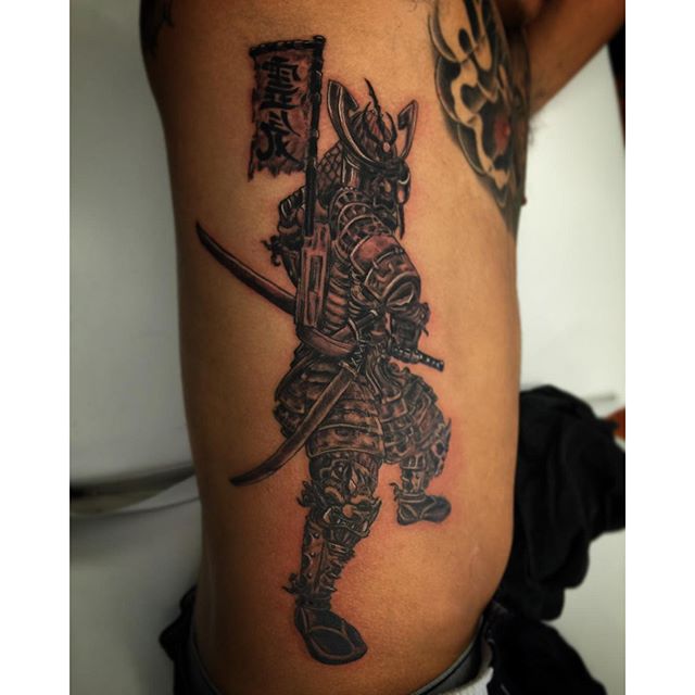Man Side Rib Samurai Tattoo On Side Rib