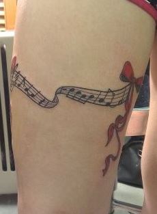 Music Notes Garter Tattoo On Thigh