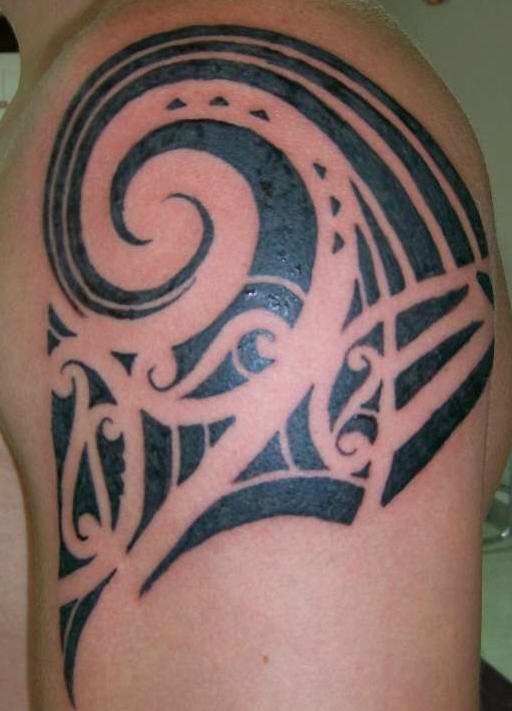 Nice Black Tribal Wave Tattoo On Left Shoulder