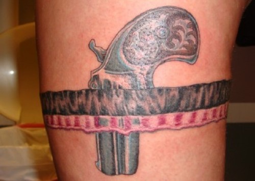 Pistol Garter Tattoo On Thigh