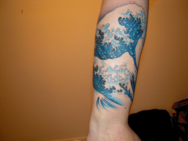 Realistic Waves Tattoos On Arm