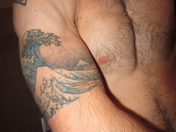 Right Bicep Wave Tattoo For Men