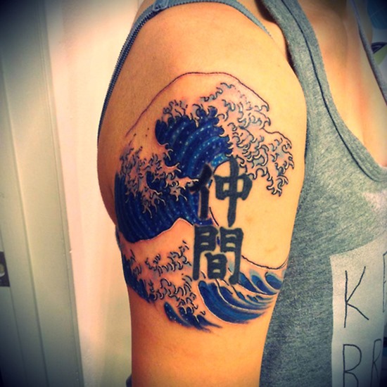 Right Shoulder Wave Tattoo