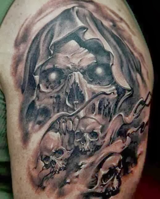 Ripped Skin Vampire Skull Tattoo On Shoulder
