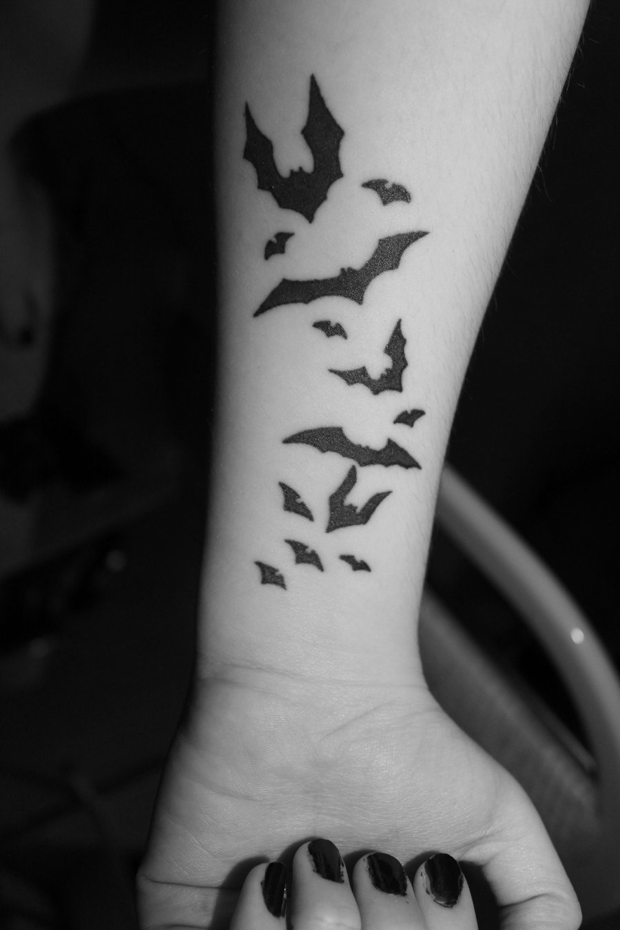 Silhouette Vampire Bat Tattoo On Girl Wrist