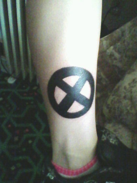 Silhouette X Men Symbol Tattoo On Leg By Lette Kitt