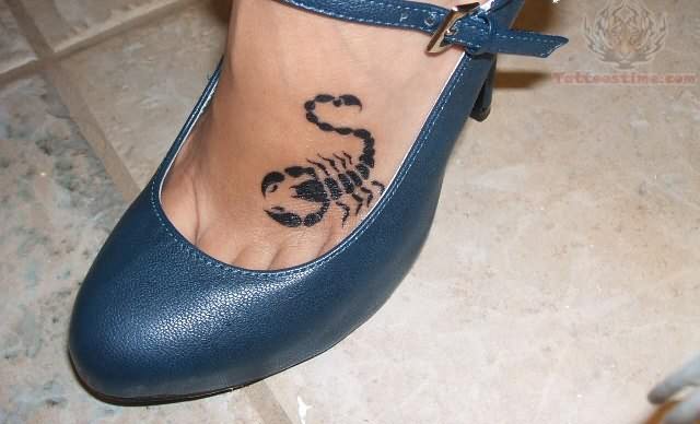 Simple Black Little Scorpion Tattoo On Girl Foot