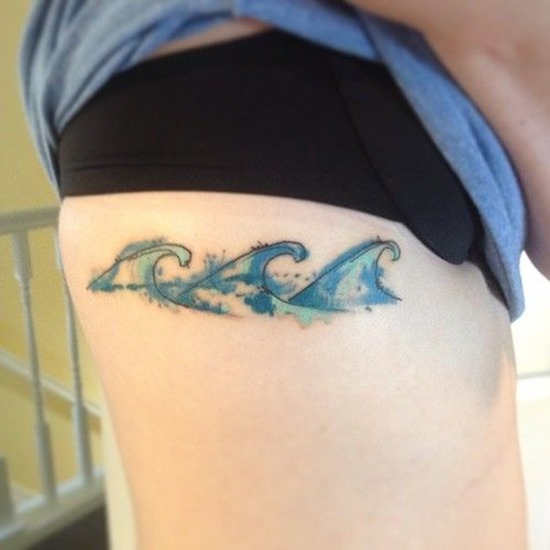Simple Blue Wave Tattoos On Girl Side Rib