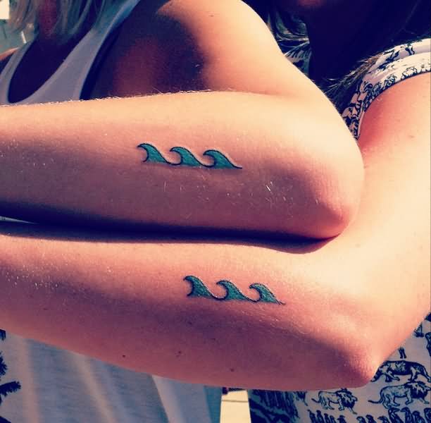 Simple Wave Tattoo On Couple Arm