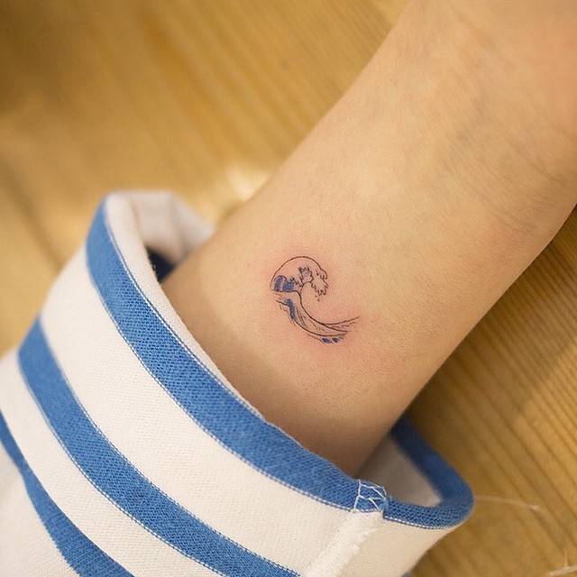 Small Cute Wave Tattoo On Forearm
