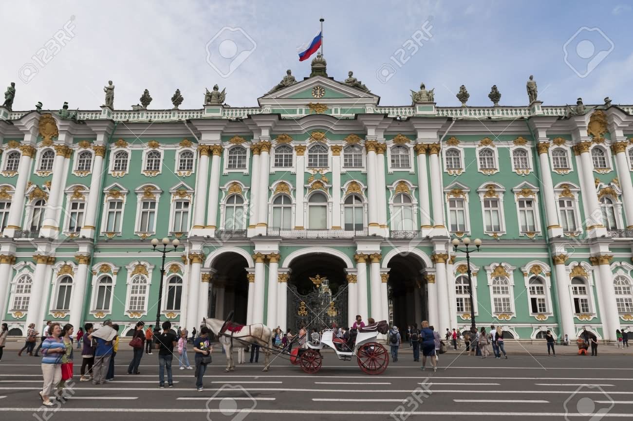 Tourists In Front Of Winter Palace At Hermitage Museum