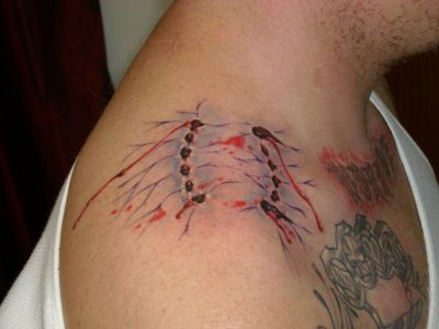 Vampire Bite Tattoo On Upper Shoulder