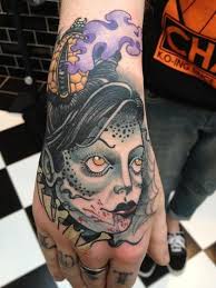 Vampire Girl Face Tattoo On Hand