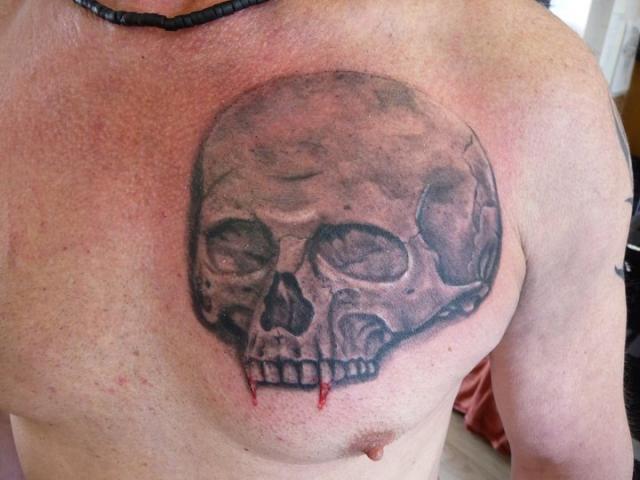 Vampire Skull Tattoo On Man Chest