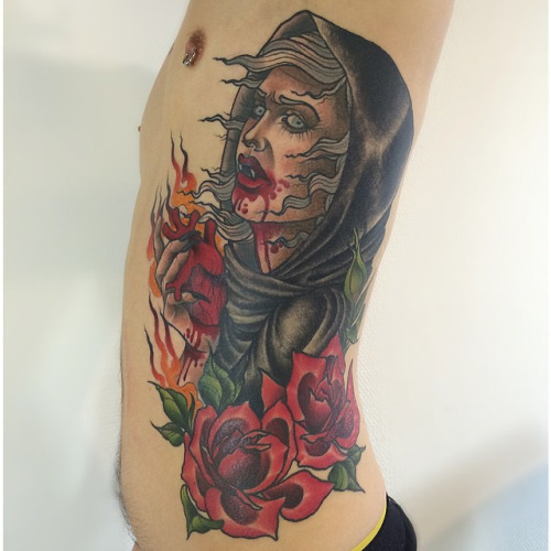 Vampire With Roses Tattoo On Man Side Rib