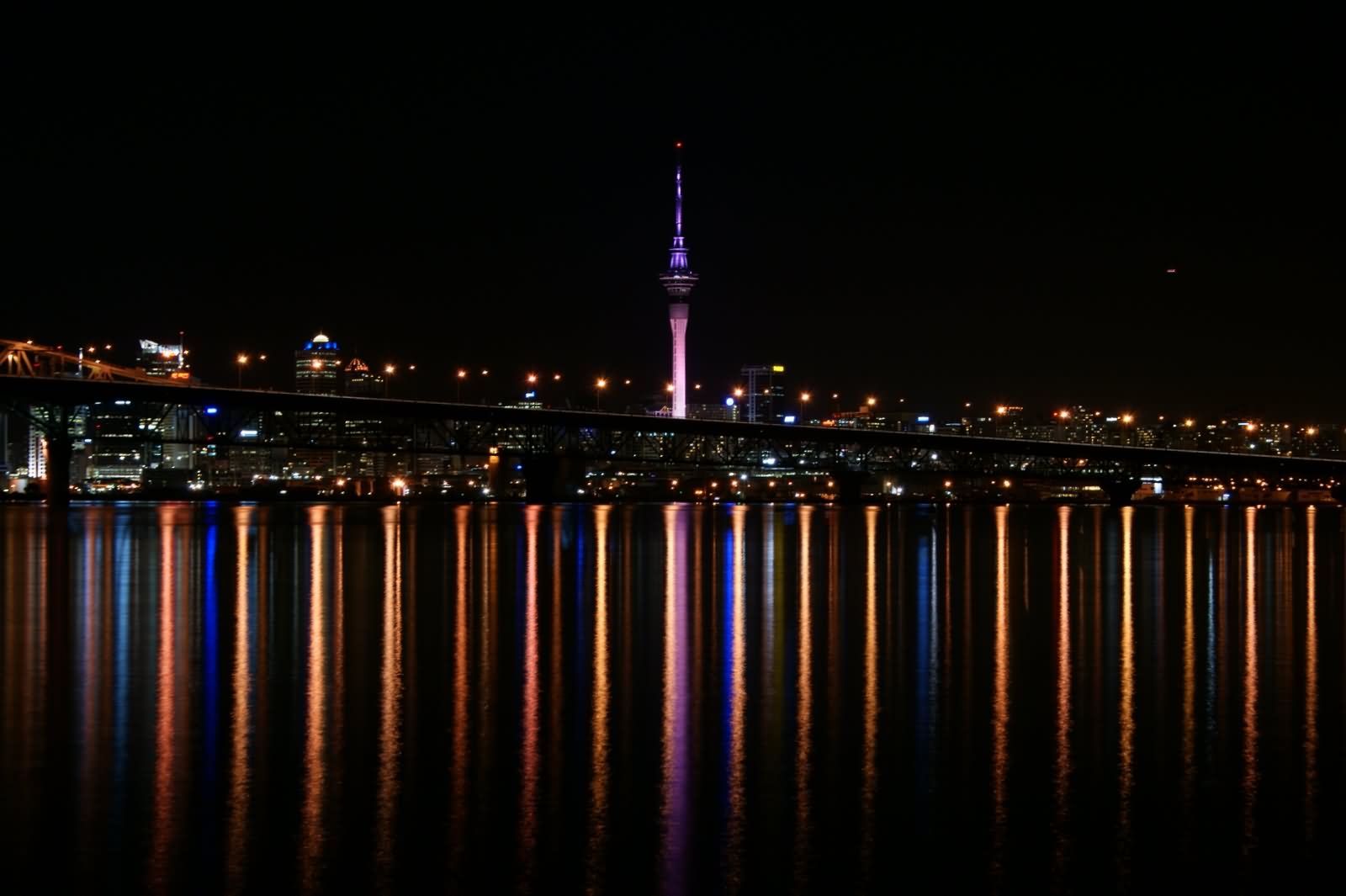Water Reflection Of The Sky Tower Night Picture