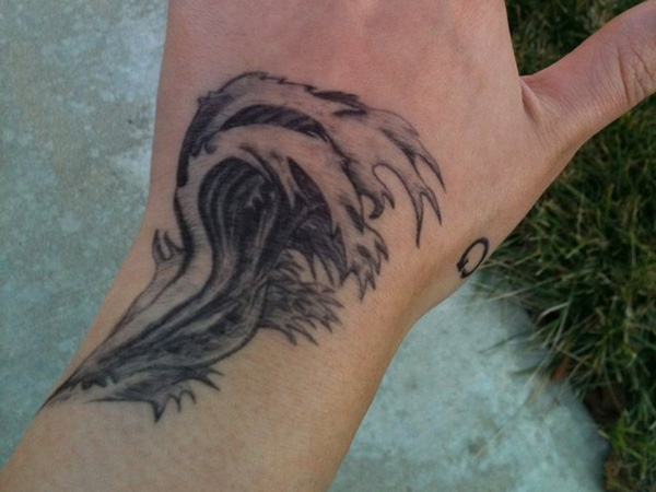 Wave Tattoo On Left Hand