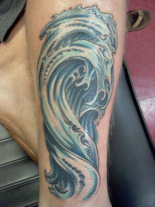 Wave Tattoo On Leg