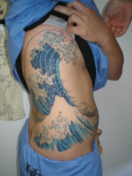 Wave Tattoo On Rib Side For Girls