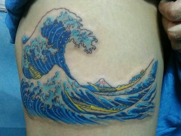Wave Tattoo On Right Bicep