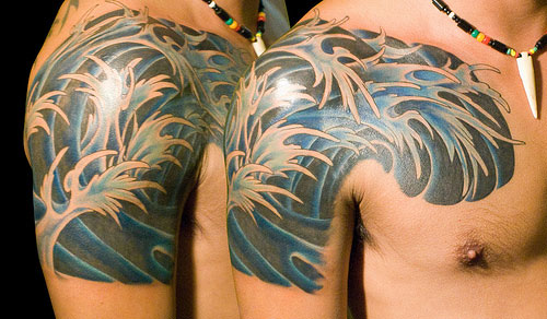 Wave Tattoo On Right Shoulder