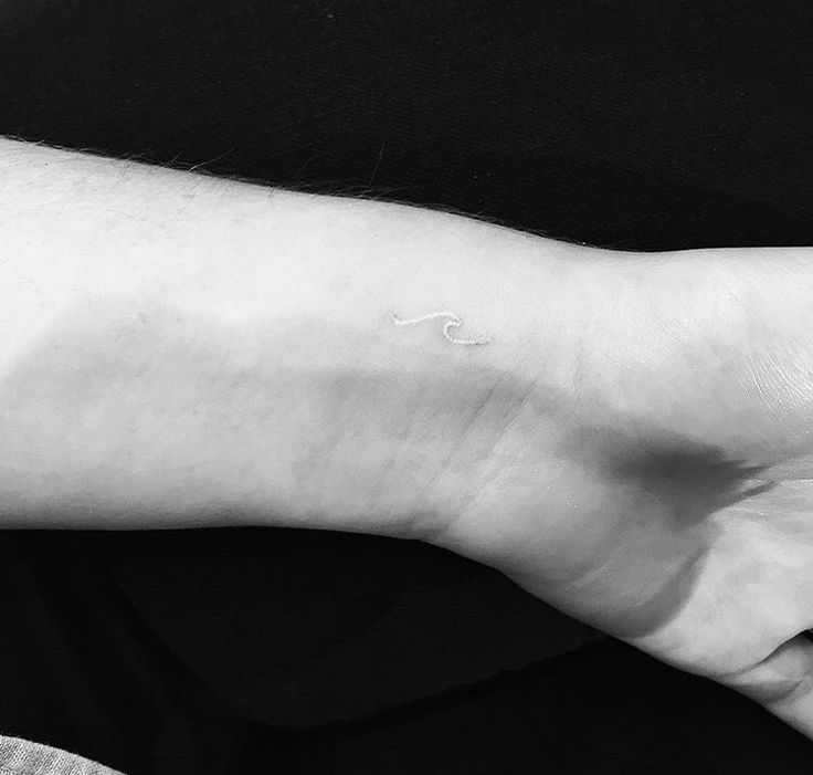 White Ink Wave Tattoo On Left Wrist
