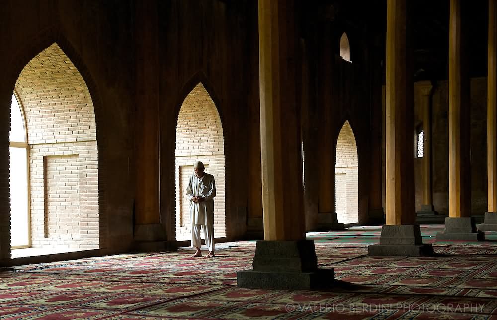 A Muslim Man Prays Inside The Jamia Masjid