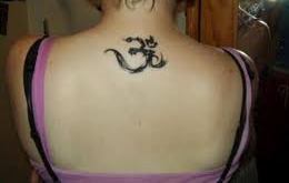 Amazing Om Tattoo On Women Upper Back