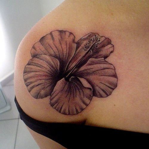 Black And White Hibiscus Tattoo On Front Shoulder