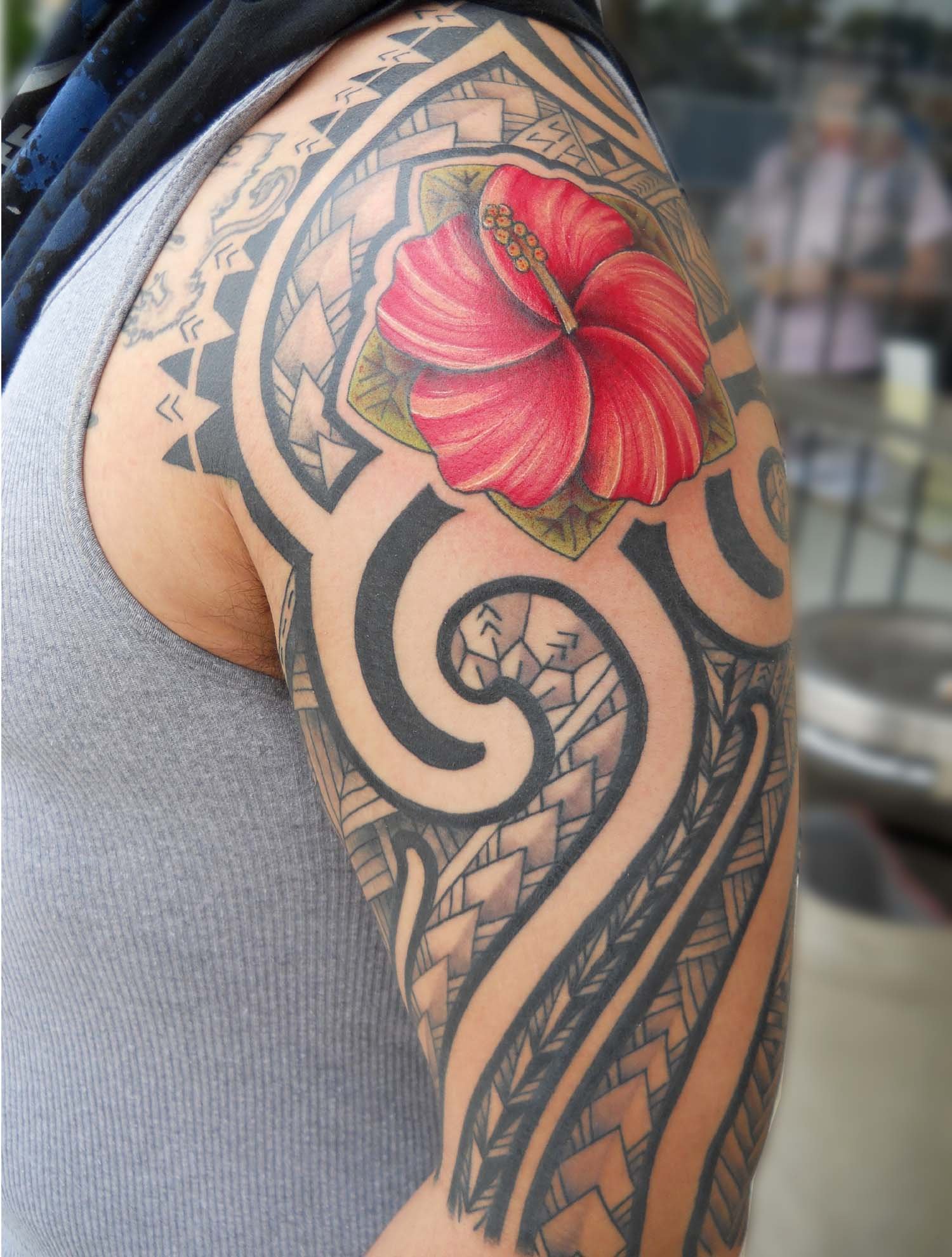 Black Tribal And Hibiscus Tattoo On Left Shoulder
