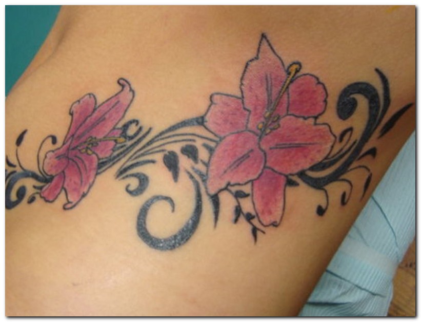 Black Tribal And Pink Hibiscus Tattoo