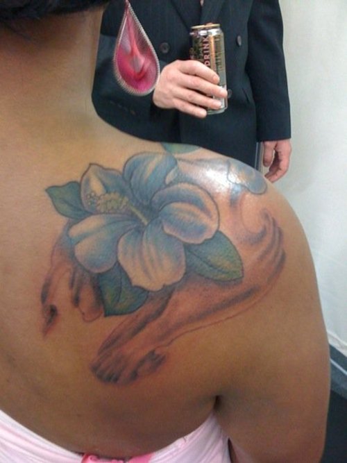 Blue Ink Hibiscus Tattoo On Right Back Shoulder