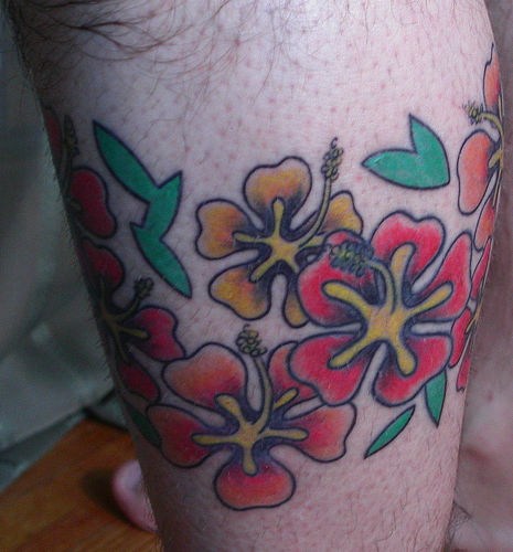 Colored Flowers Hibiscus Tattoo On Leg