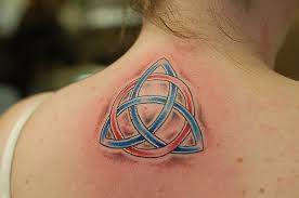 Colorful Celtic Knot Tattoo On Women Upper Back