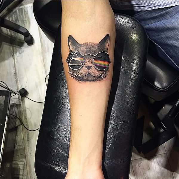 Cross Stitch Cat Face Tattoo On Forearm