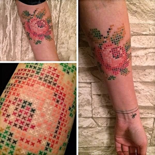 Cross Stitch Flower Tattoo On Forearm