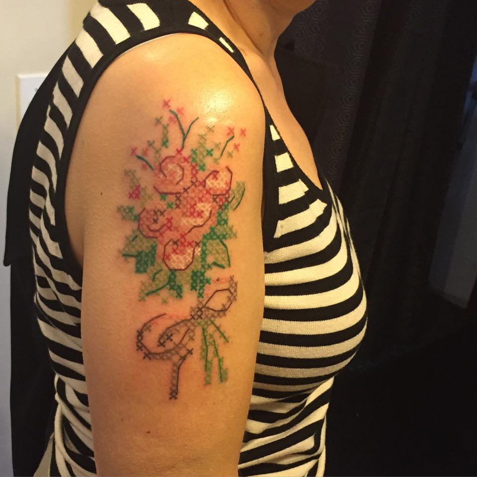 Cross Stitch Flowers Tattoo On Girl Right Shoulder