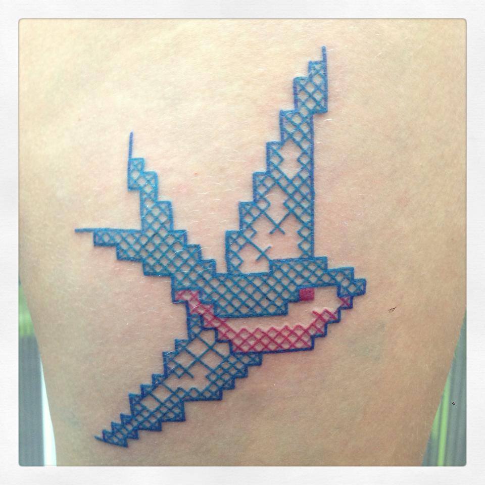 Cross Stitch Flying Bird Tattoo Design