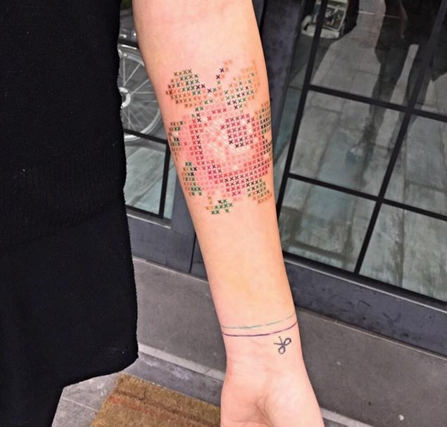 Cross Stitch Rose Tattoo On Forearm