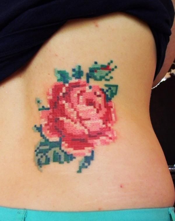 Cross Stitch Rose Tattoo On Lower Back