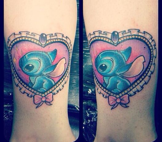 Cute Stitch In Heart Frame Tattoo Design