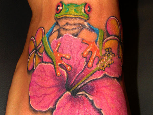 Frog And Hibiscus Flower Tattoo On Foot