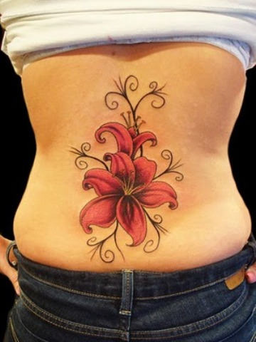 Hibiscus Flower Tattoo On Girl Lower Back