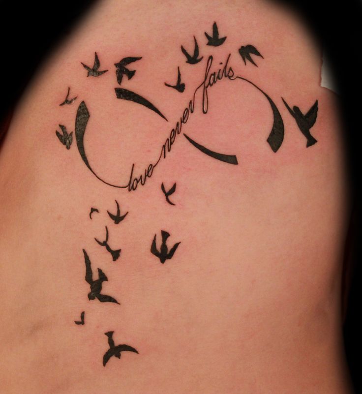 Infinity Symbol With Flying Birds Tattoo Design