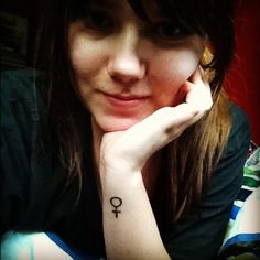 Little Female Symbol Tattoo On Women Wrist