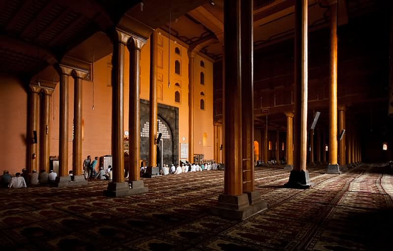 Muslims Sit For Prayer In The Immense Prayer Hall Of Jamia Masjid, Srinagar