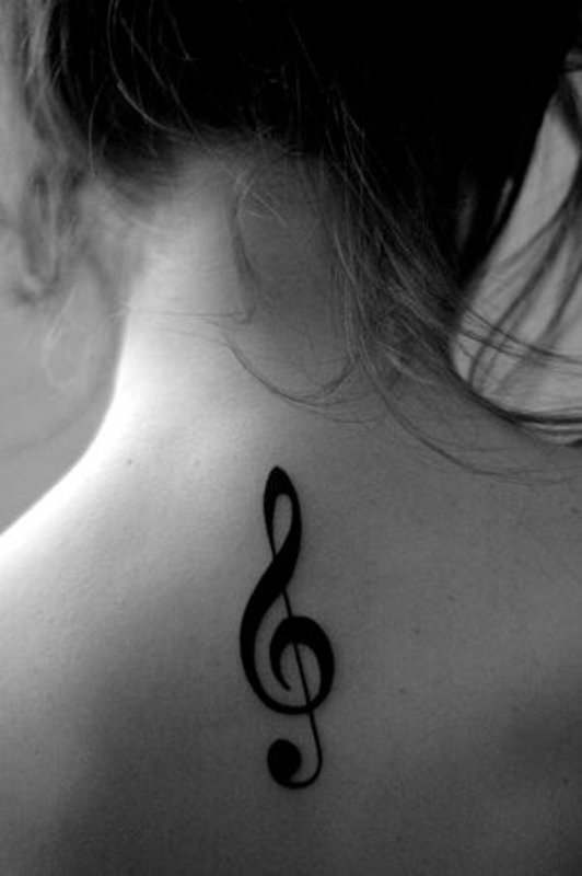 Violin Key Tattoo On Upper Back