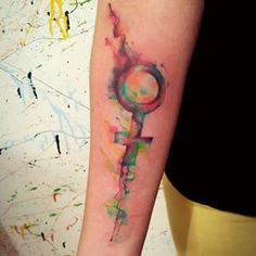 Watercolor Female Symbol Tattoo On Forearm
