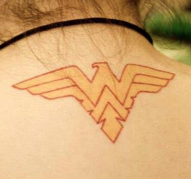 Wonder Woman Symbol Tattoo On Upper Back