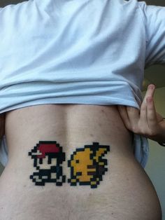 8 Bit Ash And Pikachu Pokemon Tattoo On Lower Back